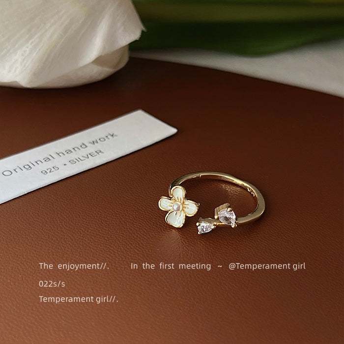 Gold Tone White Flower And Clear Stone Leaf Arrow Open Ring