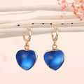 Gold Tone Heart-Shaped Blue Evil Eye Necklace and Huggie Earrings view 3