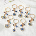 Gold Tone Blue Evil Eye Charm Keychains in Eight Designs view 1