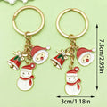 Christmas Charm Keychains Featuring Gold Santa Across 41 Pictured Variations view 10