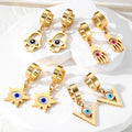 Gold Tone Evil Eye Hamsa and Star Huggie Drop Earrings view 1