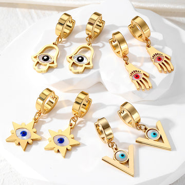 Gold Tone Evil Eye Hamsa and Star Huggie Drop Earrings