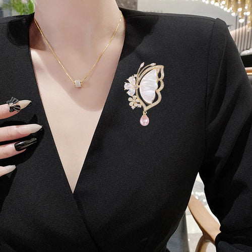 Angled display of the brooch showing its raised decorative details