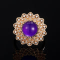 Gold Tone Purple Cabochon Floral Statement Ring With Polished Clear Stone Detail view 2