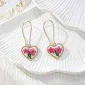 Gold Tone Heart-Shaped Pressed Flower Drop Earrings in Six Designs view 3