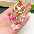 Twelve Pink and Red Rose Heart Metal Keychain Designs view 3