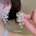 Clear Floral Crystal Drop and Chain Fringe Earrings view 4