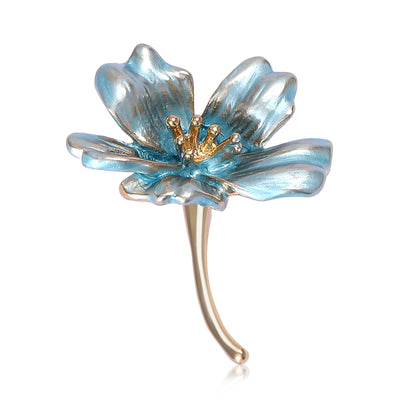 Light blue enamel flower brooch with gold stem front on white