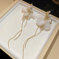 White Flower Pearl Tassel Earrings With Gold-Tone Settings view 6