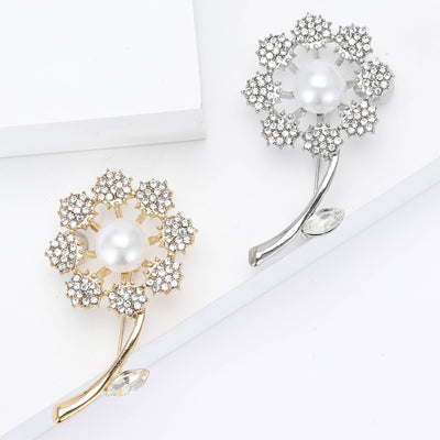 A round dandelion-like bloom with a pearl-like center and curved stem shown on a white background