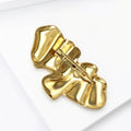 Folded Ribbon Brooch In Sculptural Silver And Gold Tones view 3