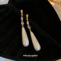 Gold Tone Long Chain White Teardrop Pearl Drop Earrings view 2