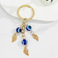 Evil Eye Beaded Tassel Keychain with Leaf Charm Accents view 3