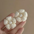 White Floral Pearl and Shell Statement Earrings Assortment view 2