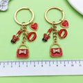 Fashion Accessory Charm Keychains Featuring Red Lipstick Across 43 Pictured Variations view 4