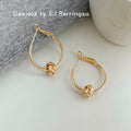 Gold Knot Accent Teardrop Hoop Earrings Lever Back view 4