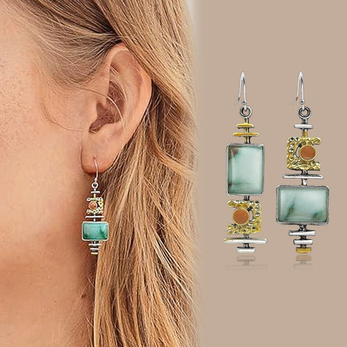 Alternate close view of the Green Asymmetric Pair earring design highlighting its color and metal finish