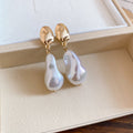 Gold Tone Baroque Pearl Drop Earrings With Polished Metal Details view 7