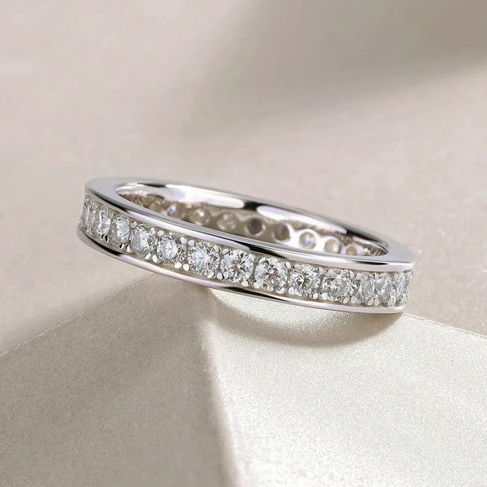 Slim Channel-Set Clear Stone Band In Three Metal Finishes