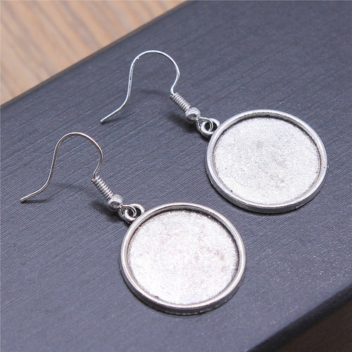 Round Cabochon Tray Dangle Earrings in Two Antique Finishes shown in image 2 with plain round trays on fishhook ear wire