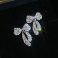Crystal Bow and Planet Motif Stud Earrings in Three Designs view 6