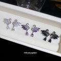 Swan and Teardrop Stud Earrings in Four Monochrome Styles view 3