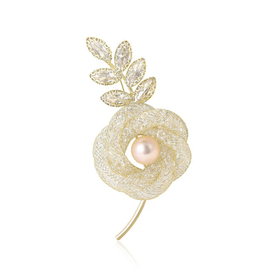 Open crystal rose with a pearl-like center and leafy stem brooch front view