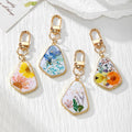 Irregular Pressed Flower Resin Keychains in Six Designs view 1