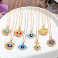 Gold and Silver Tone Crystal Evil Eye Pendant Necklaces in Eight Styles view 1