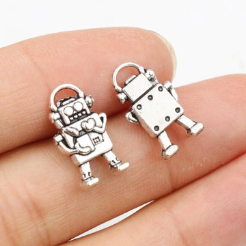 Small Articulated Robot Charm in an Antique Silver Tone Finish