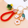 Mixed Floral Clover Leaf and Daisy Charm Keychains with Wrist Loops view 3