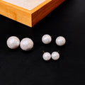 White Textured Pearl Look Stud Earrings in Three Sizes view 1
