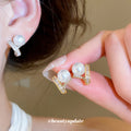Pearl and Geometric Stud Earrings in Two Metal Tones view 1