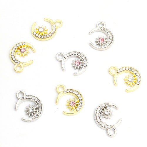 Color and design selection of small crystal-lined moons with clear or pink stones