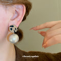Leopard Print Disc and Champagne Pearl Drop Stud Earrings view 3