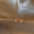 Square Orange Crystal Halo Stud Earrings in Gold Tone view 3