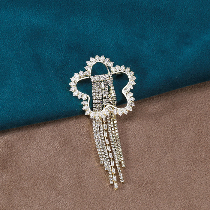 Silver-Tone Crystal Flower And Chain Tassel Brooch