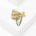 Crystal Bee Brooch in Metal with Translucent Wings and a Large Faceted Abdomen Stone view 4
