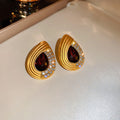 Gold Tone Red Teardrop Necklace and Stud Earrings with Polished Metal Accents view 7