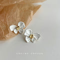 White Enamel Bow Stud Earrings With Gold Center Knot view 3