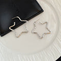Silver Tone Hammered Outline Five Point Star Hoop Earrings view 3