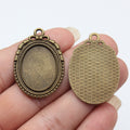Oval 18 x 25 mm Cabochon Pendant Settings in Two Finishes view 3