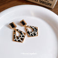 Black and White Geometric Drop Earrings with Gold Tone Frames view 4