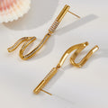 Long Crystal Wave Drop Earrings in Polished Gold Tone view 3
