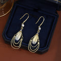 Gold Cats Eye Oval Drop Earrings Triple Ball Chain Swags view 4