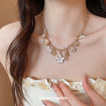 Gold Tone Ocean Charm and Flower Chain Necklaces Statement Jewelry view 3