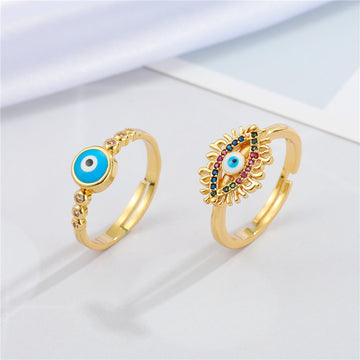 Gold Tone Multicolor Lash and Round Blue Evil Eye Adjustable Rings