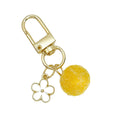 Wool Felt Ball Keychain With White Enamel Flower Charm And Gold-Tone Clasp view 5