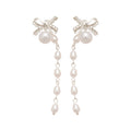 Crystal Bow Pearl Tassel Earrings With Polished Metal Tone Details view 5