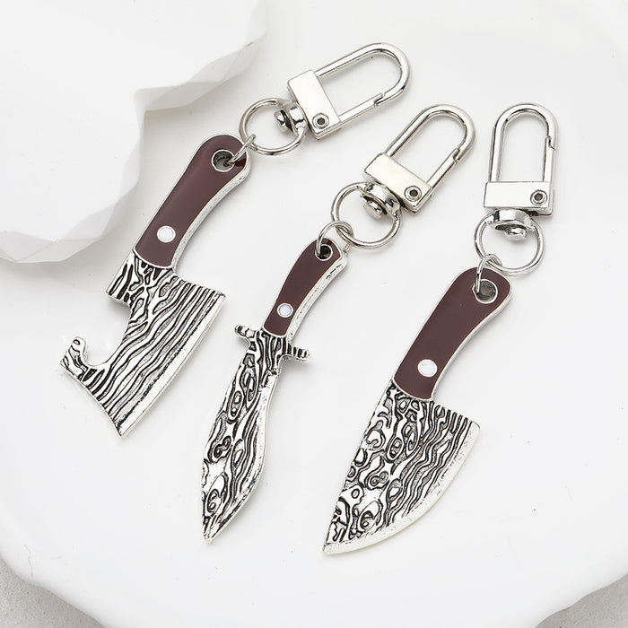 Silver Tone Faux Woodgrain Knife and Cleaver Clip Keychains